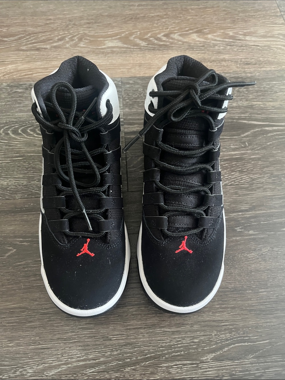 Jordan Black and White High-Top Sneakers with Red Jumpman